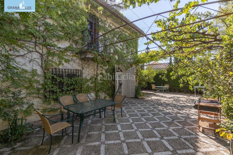 Foto adcde0fc-9680-4e31-b42f-9ef56ecb142f. Chalet magnifico chalet con amplio jardines y piscina en cortijo del aire! en Albolote