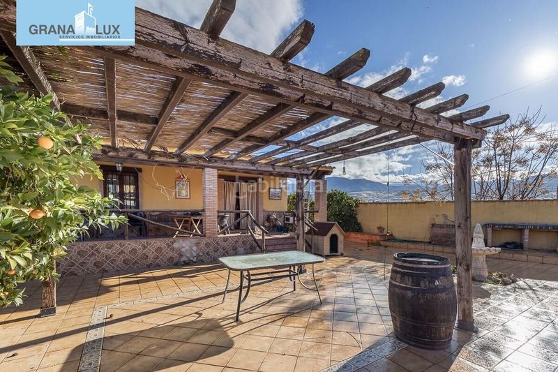 Foto c7e4939e-6565-406b-85ac-8c4e38d484fe. Chalet fantástica villa con infinidad de posibilidades en Zubia (La)