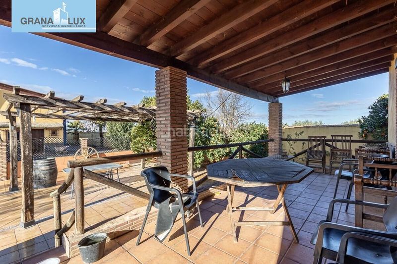 Foto d11bac2d-686e-4dd2-b9ae-38e65a9450d6. Chalet fantástica villa con infinidad de posibilidades en Zubia (La)