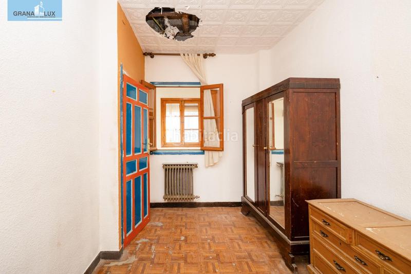 Foto 08657be7-8a57-41ca-9383-945551cd308a. Casa adosada casa con encanto a reformar en plena cuesta del chapiz. patio, varias terrazas y mucho más en Granada