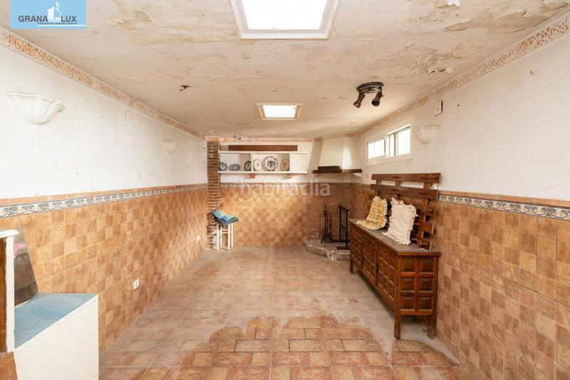 Foto 58eb27bf-b82f-4e08-95cc-b1da53bb02e9. Casa adosada casa con encanto a reformar en plena cuesta del chapiz. patio, varias terrazas y mucho más en Granada