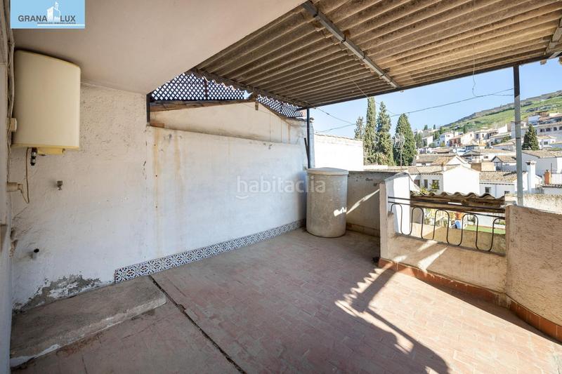 Foto 78616b6d-3793-46a0-9bba-eb3cc807abb7. Casa adosada casa con encanto a reformar en plena cuesta del chapiz. patio, varias terrazas y mucho más en Granada