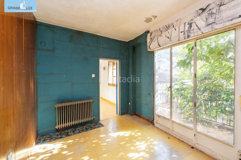 Foto afab3ed3-0a2a-4b48-8932-cd566475e863. Casa adosada casa con encanto a reformar en plena cuesta del chapiz. patio, varias terrazas y mucho más en Granada