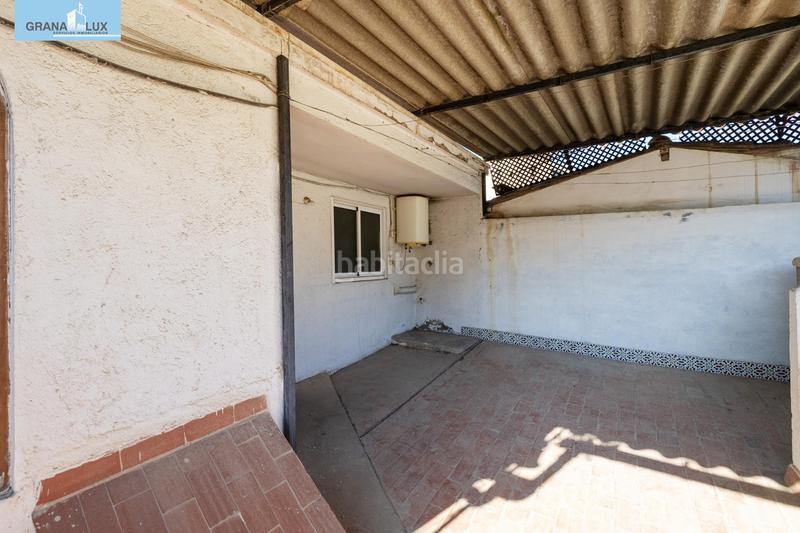 Foto ea8aaa98-ae3c-497a-8934-dfe8f4f47c44. Casa adosada casa con encanto a reformar en plena cuesta del chapiz. patio, varias terrazas y mucho más en Granada
