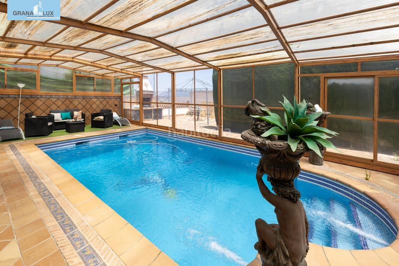 Foto f0c89a99-c073-4fe1-b853-938d3d34e800. Chalet exclusivo chalet en Barrio de la Vega en Barrio de la Vega Monachil