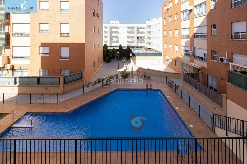 Foto 37e23784-5367-46a2-81b7-7822c3253079. Pis amb calefacció aparcament piscina a parque nueva Granada Granada