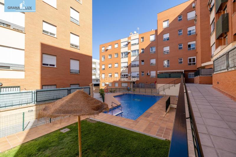 Foto aa058a8d-09b6-4bcf-9180-e4f8fcee86f9. Pis amb calefacció aparcament piscina a parque nueva Granada Granada