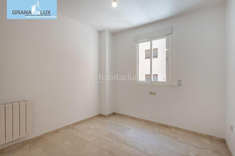 Foto 2e72397f-8f06-4603-afad-5d51deadc05f. Pis amb calefacció aparcament a Rosaleda - Juventud Granada