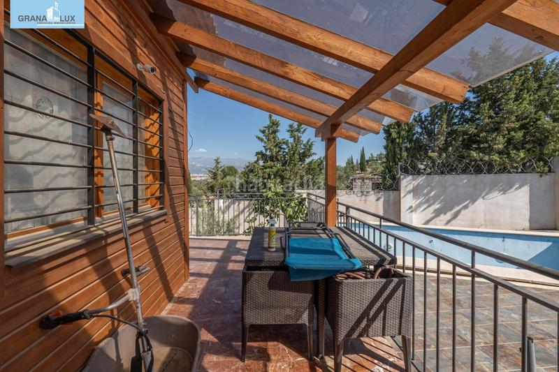 Foto 1ae43876-8c1a-47b5-80bf-520d9cfc6f8b. Chalet in calle nogal 5 in Cúllar Vega