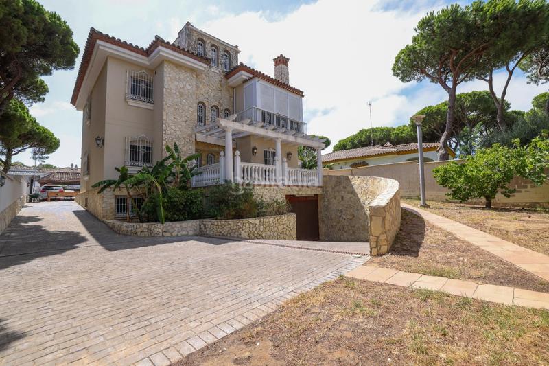 Foto 1497ecb5-64a4-4f0b-96f6-09101cdba6bd. Chalet avec chauffage parking piscine dans La Barrosa Chiclana de la Frontera