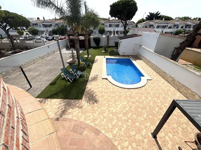 Foto 73f5ddc4-a5e8-4d81-a009-adcc59070f6c. Chalet avec chauffage parking piscine dans La Barrosa Chiclana de la Frontera