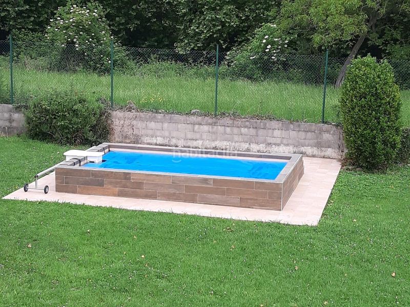 Foto 4f82ab45-a957-4a89-98ab-3c7a12b9a7bc. Casa amb calefacció aparcament piscina a Puente Viesgo