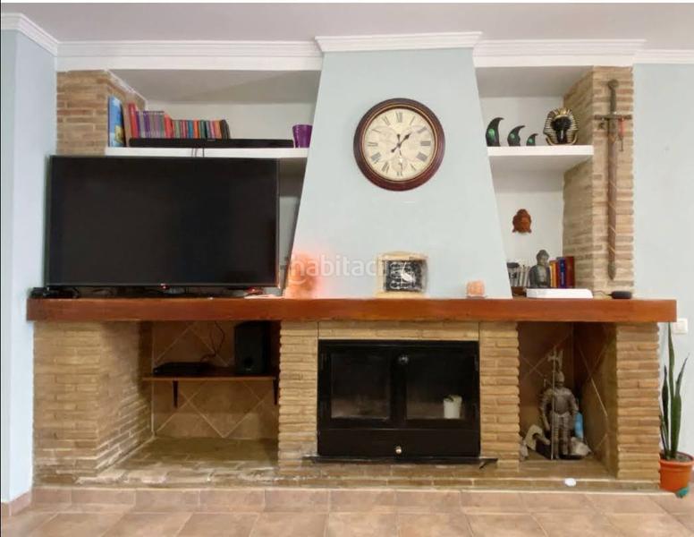 Foto 193c456c-53da-48a7-8836-de38b2610ccb. Maison jumelée avec cheminée dans Bellreguard