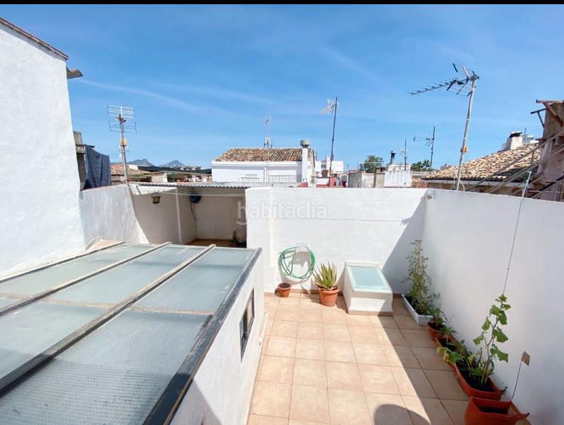 Foto a7404965-28c3-4fd9-aaa1-9efea2097db7. Maison jumelée avec cheminée dans Bellreguard