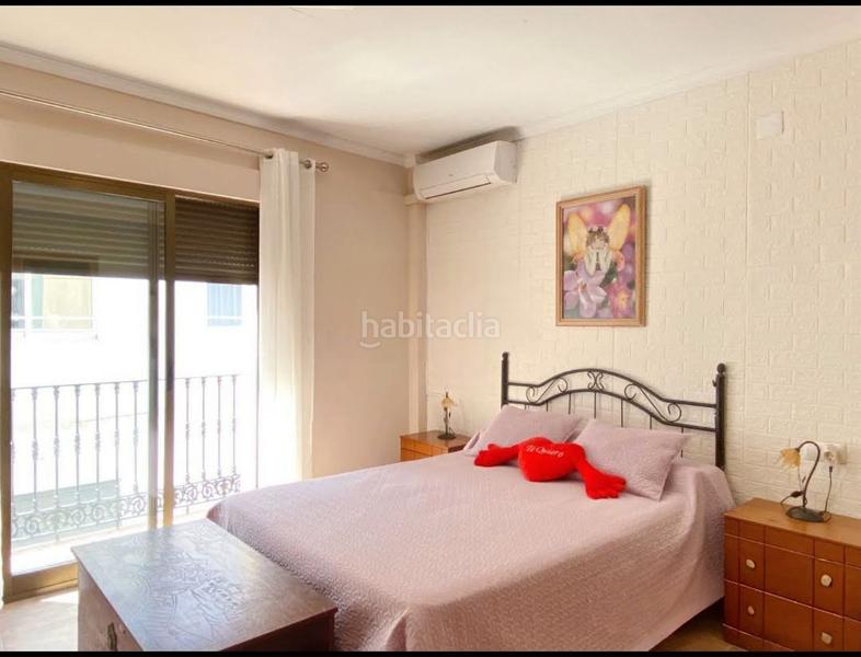 Foto bcc0dfc2-fdd5-45f4-8260-033af777f1f9. Maison jumelée avec cheminée dans Bellreguard