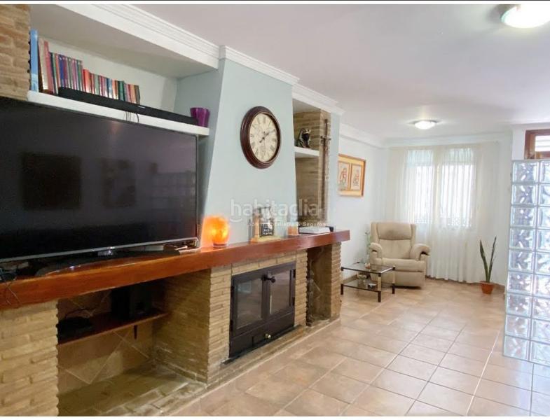 Foto c864a516-80d8-4edb-aa3a-19eef50bb084. Maison jumelée avec cheminée dans Bellreguard