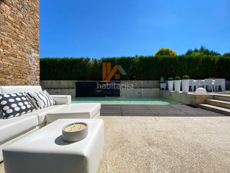 Foto 699099ac-6bad-4e4f-a3cd-a842e5208a32. Xalet a lugar framan 38 a Bugallido Ames