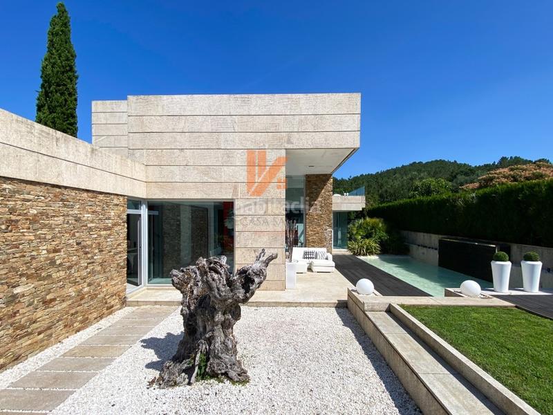 Foto 99758ab1-5951-4ee2-9410-c144c7788cfc. Xalet a lugar framan 38 a Bugallido Ames