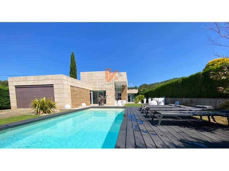 Foto a39194a0-f785-4099-8a02-e00de7dc3e44. Xalet a lugar framan 38 a Bugallido Ames