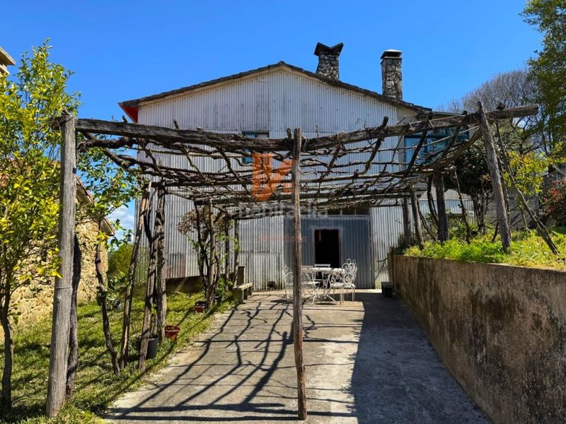 Foto d3382b04-0453-4494-bddc-9a7cb1a0bef2. Casa amb aparcament a Estrada (A)
