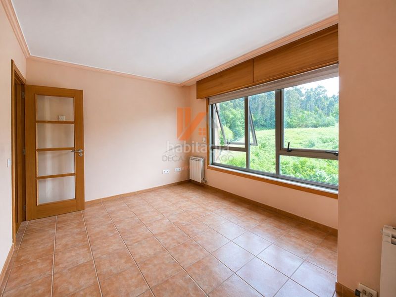 Foto 18ac9e00-3c29-4d6c-8ed0-97a698a932d2. Apartament amb aparcament a O Milladoiro Ames