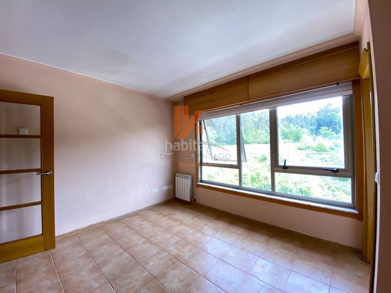 Foto 4bcdb361-4a8d-4ccd-b9c8-6d0b2ea94b93. Apartament amb aparcament a O Milladoiro Ames