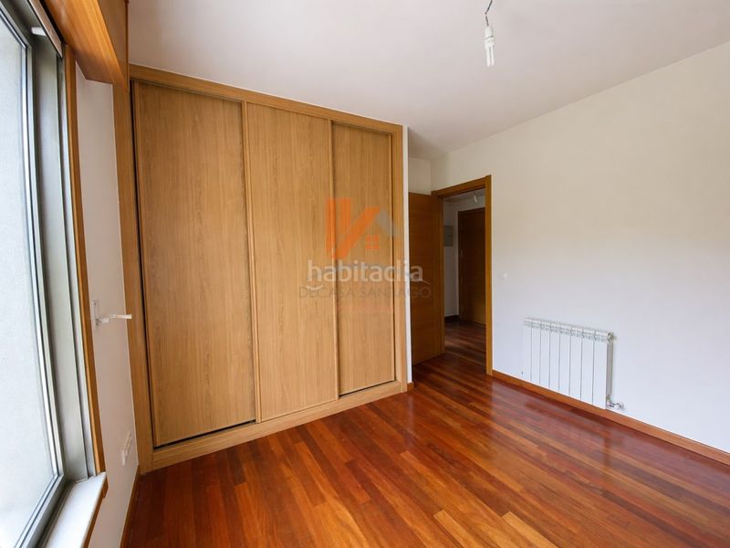 Foto bdfa1199-2f47-493e-b239-389ec50ab6b8. Apartament amb aparcament a O Milladoiro Ames