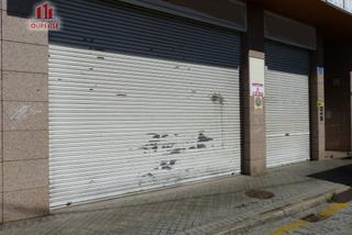 Local Comercial a Posío. Local comercial con tres plazas de garaje con vado