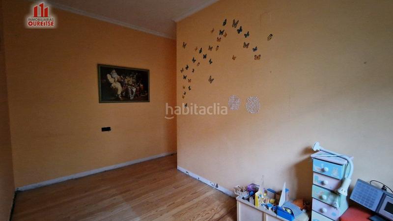 Foto f99f0549-ea31-468d-a3ba-4290607ec904. Casa  en el casco urbano en A Carballeira Ourense