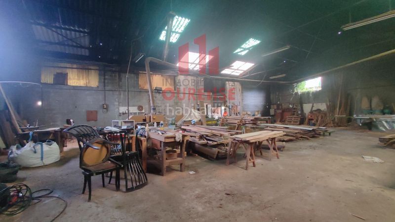 Foto d39cbee2-0ef1-4a77-9895-9706ef52210f. Nau industrial a Toén