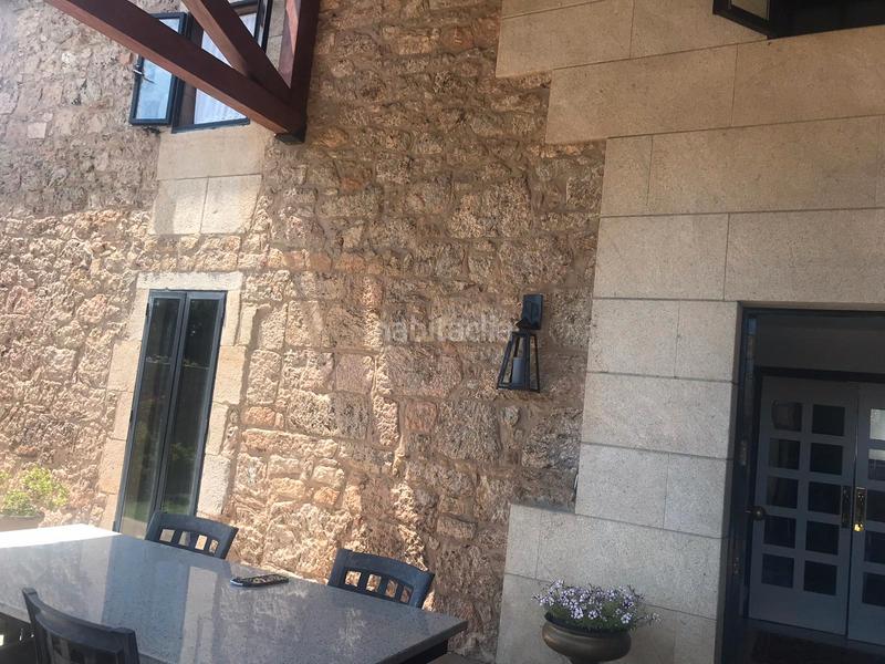 Foto 081c77b4-d1e7-432e-b8f0-aec7c91a0079. Chalet avec cheminée chauffage parking piscine dans Teo