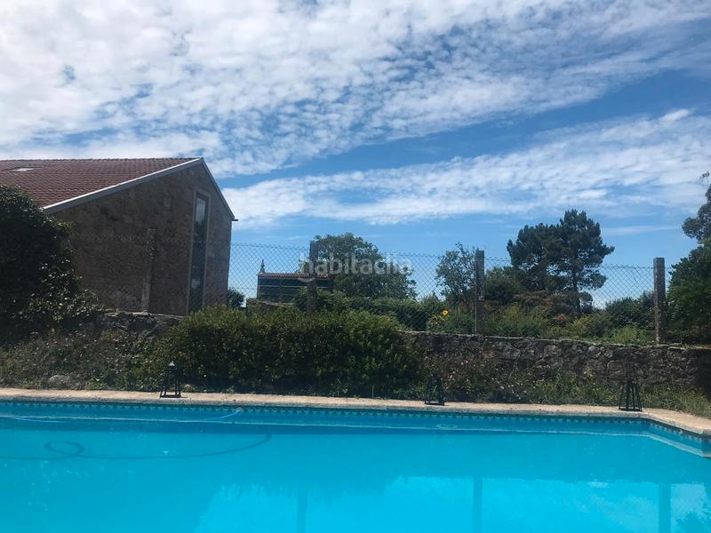 Foto 5acaa1cf-55db-45b4-b707-d810ddf9b556. Chalet avec cheminée chauffage parking piscine dans Teo