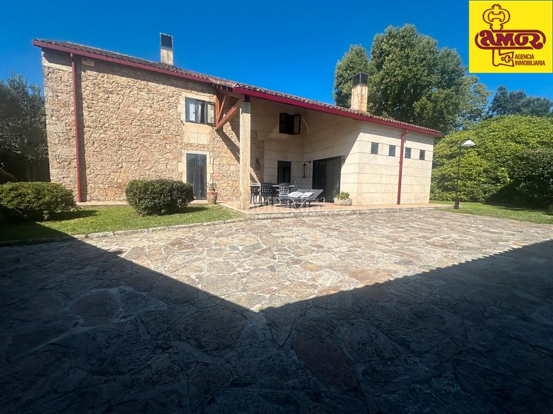 Foto e0b3cf63-48a6-4c56-8a35-a09e3a5493a9. Chalet avec cheminée chauffage parking piscine dans Teo