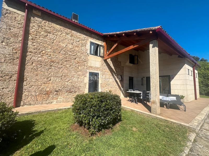 Foto feb327e5-69c1-4527-a4d2-e6ce55cc01d5. Chalet avec cheminée chauffage parking piscine dans Teo