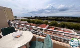 Estudi  Carrer de la muga. Estudio con terraza y vistas panorámicas al mar en empuriabrava