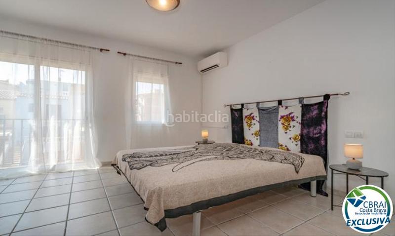 Foto 24f68473-d679-4a10-a5b2-e20de743f7be. Casa adosada casa céntrica con piscina comunitaria en gran reserva, en Empuriabrava