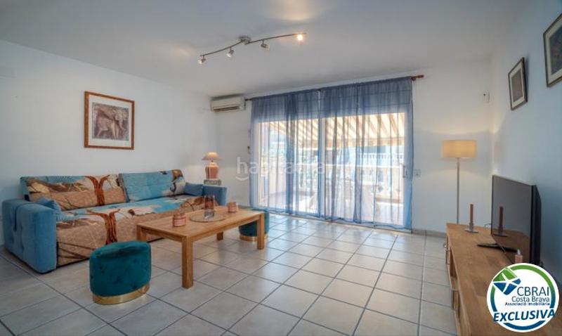 Foto ffe33e67-cca0-49a2-82fe-af2487b0a576. Casa adosada casa céntrica con piscina comunitaria en gran reserva, en Empuriabrava