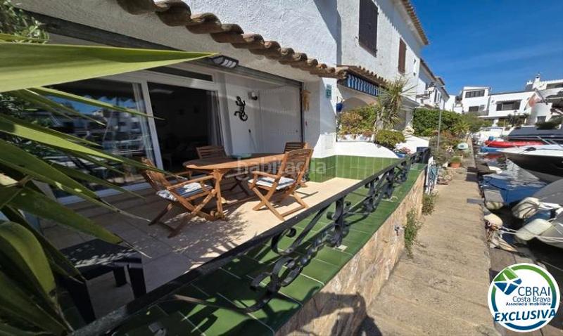 Foto 24cbaf7e-7d96-4856-8538-078d61b77fed. Casa adosada casa de pescador con amarre de 10m x 4,5m en illa cartago en Empuriabrava