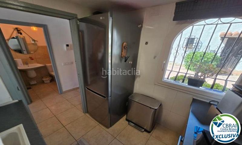 Foto d18fc061-8b0b-42f6-8cb4-8577805a31a1. Casa adosada casa de pescador con amarre de 10m x 4,5m en illa cartago en Empuriabrava