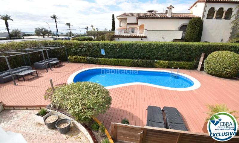Foto 1ecbf866-4675-48b0-ae90-0d79c23da9b7. Casa complejo de seis casas con amarre en primera línea de mar en Empuriabrava