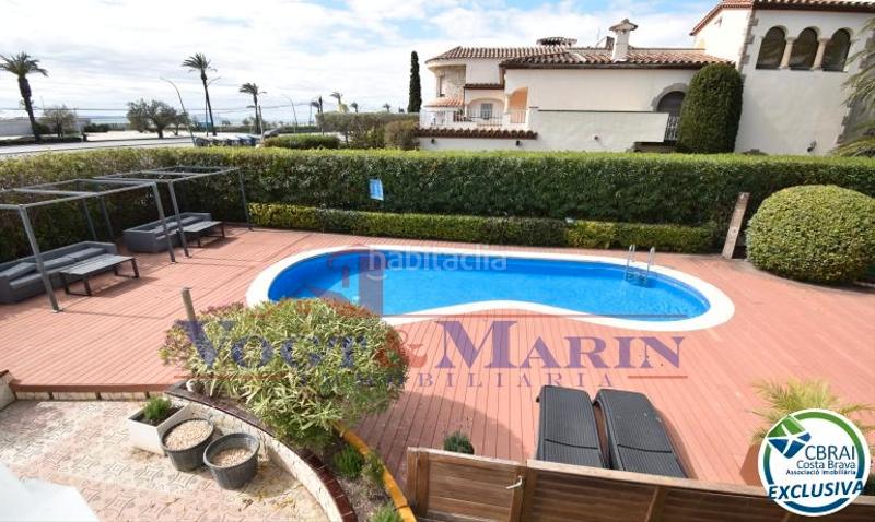 Foto 9b45a25d-97d9-49ef-a1e6-39db1be3e4c0. Casa complejo de seis casas con amarre en primera línea de mar en Empuriabrava