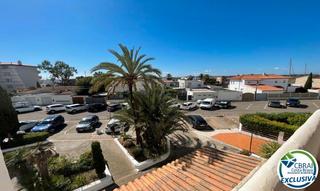 Appartement  Carrer port joan. Acogedor apartamento con piscina y jardín comunitario
