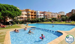 Appartement  Carrer badia-gran reserva. Apartamento reformado con piscina a pocos pasos de la playa en e