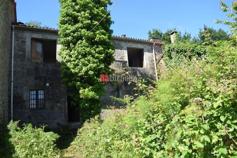 Foto 3432f72b-0aa7-4635-85b6-3e124396a08c. Casa adossada amb calefacció aparcament a Teo