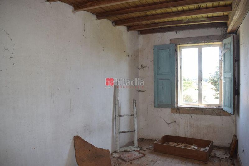 Foto 54c26bcf-1469-44b9-a92e-2e87e2223804. Casa adossada a Teo