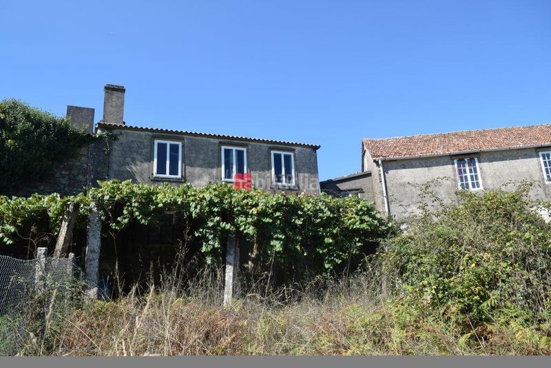 Foto fd5b0480-13f2-48fa-af57-0fbca3ff8900. Casa adossada a Teo
