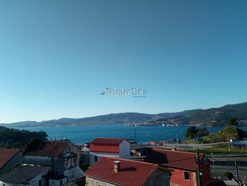 Foto 10402da5-aa04-431a-8573-2f2c34d1d9c9. Casa adossada amb calefacció aparcament a Navia Vigo