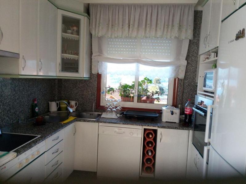 Foto 5e356d30-b3b2-4796-b8a4-34acf69fc49d. Casa adossada amb calefacció aparcament a Navia Vigo