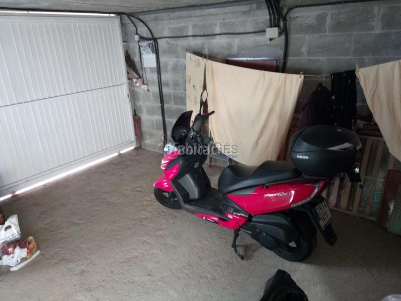 Foto 703ed726-a745-445d-8770-836e158ff7de. Casa adossada amb calefacció aparcament a Navia Vigo