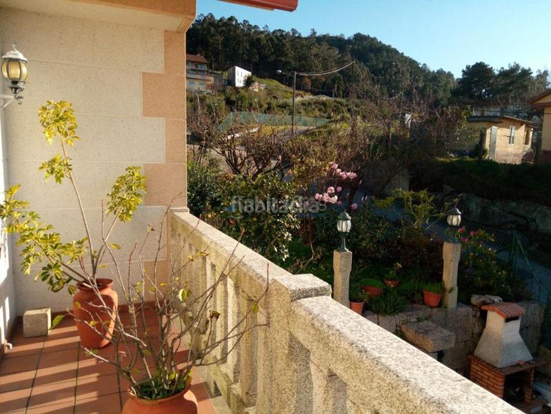 Foto e9a04b09-fe20-497f-bf22-fbc050726993. Casa aparellada amb calefacció aparcament a Navia Vigo
